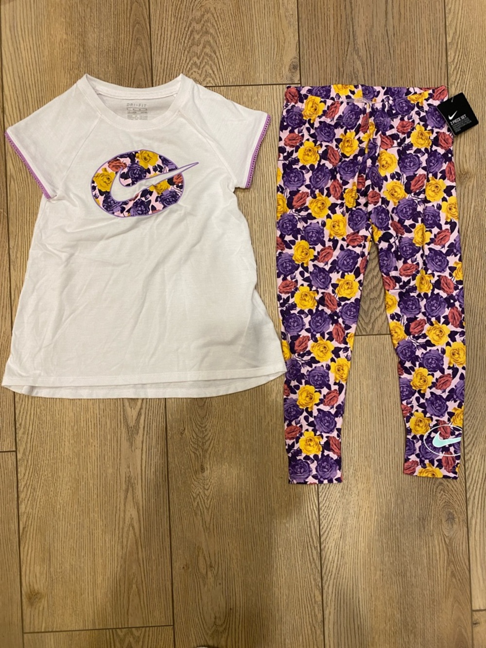 Nike White Tee & Purple-Yellow Floral Leggings Kids Set